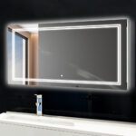 The Soho 84 Inch LED Lighted Bathroom Mirror, featuring illuminated borders, is mounted above a white sink and faucet, reflecting a window and part of the room.