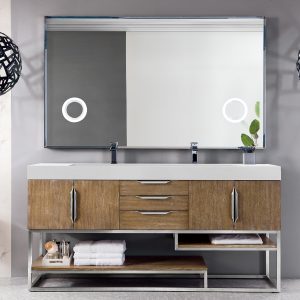 A modern bathroom features the Columbia 72 Latte Oak double-sink vanity with brushed nickel, complete with drawers and shelves, topped by a large mirror. Two black spherical pendant lights elegantly hang from the ceiling, while a window to the right bathes the space in natural light.