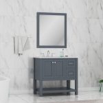 A modern bathroom showcases the Wilmington 36 Inch Bathroom Vanity Cabinet in Gray (no top), paired with a white countertop, silver faucet, matching mirror, gray towels on a rack, and white marble wall tiles.