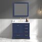 A modern bathroom showcases a Copenhagen 36 inch navy blue vanity with Carrara marble top, gold hardware, a matching mirror, pendant lighting, and gray and white paneled walls over a marble floor.