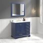 A stylish bathroom features the Copenhagen 36 inch Bathroom Vanity in navy blue with a Carrara marble top, gold hardware, and a large mirror, set against gray and white walls with modern pendant lighting and white marble tile flooring.
