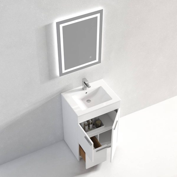 A minimalist bathroom setup features the Hanover 24 inch Bathroom Vanity in Matte White, with two cabinet doors and a drawer for toiletries. A wall-mounted, backlit square mirror hangs above against a light gray wall.