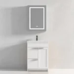 The Hanover 24 inch Bathroom Vanity With Sink boasts a modern white finish, two drawers, a cabinet, and a sleek faucet, perfectly complemented by a light gray wall and a rectangular frameless mirror above.