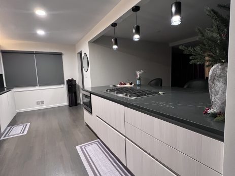 Modern Kitchen with Cream Oak Cabinets and Quartz Countertop