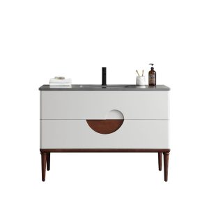 The Burano 48 inch Beige Freestanding Bathroom Vanity features a beige front, wooden legs, black countertop and faucet, plus stylish accessories like folded towels, a soap dispenser, and a toothbrush holder.