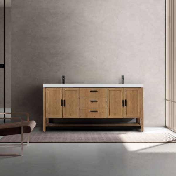 Minimalist bathroom interior with the Revival 72 Pecan Oak Freestanding Vanity featuring a white countertop, dual sinks, and ample storage. Textured neutral walls, a light rug, and a glimpse of a modern chair on the left are lit by sunlight through slatted blinds.