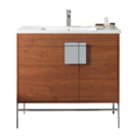 The Shawbridge 36 inch Modern Bathroom Vanity With Sink features a modern wooden design, white countertop, silver faucet, geometric silver handles, and slim metal legs. Toiletries are neatly placed on the right side for added convenience.