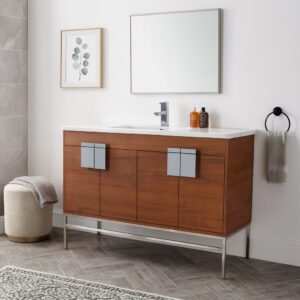 Modern bathroom with a Shawbridge 48 inch Modern Bathroom Vanity With Sink, silver handles, a rectangular mirror, two bottles on the counter, a towel on a black ring, a botanical print, and a textured stool on herringbone tile.