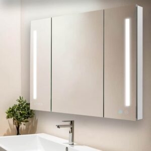 The Signature Royale 40 Inch x 36 Inch LED Lighted Mirror Medicine Cabinet features three mirrored doors, vertical LED light strips, a modern sink below, and a small green plant on the left side of the countertop.