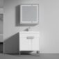 A modern minimalist bathroom showcases the Bari 30 inch Modern Bathroom Vanity With Sink, paired with a wall-mounted mirrored cabinet above the white vanity and silver faucet, set against light gray walls and flooring.