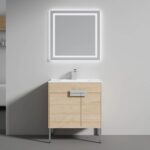 The Bari 30 inch Modern Bathroom Vanity With Sink showcases a light wood cabinet, white countertop, and rectangular sink, paired with a square, backlit mirror on a plain light gray wall.