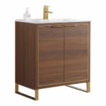 The Opulence 30 inch Modern Bathroom Vanity With Sink showcases a modern wood finish, gold metal accents, white countertop, gold faucet and soap dispenser. It stands elegantly on gold legs and includes two doors for storage.