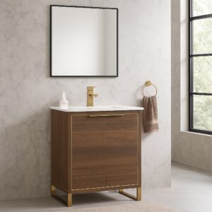 A modern bathroom showcases the Opulence 30 inch Modern Bathroom Vanity with a gold faucet, square mirror, and beige marble walls. A towel ring with a tan towel hangs by the window, and a soap dispenser accentuates the vanity.