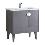 The Venezian 30 inch Bathroom Vanity With Sink showcases a modern gray finish, tapered legs, a white rectangular sink, chrome faucet, round cut-out handle, and vertical grooves on one cabinet door.
