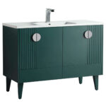 The Venezian 48 inch Bathroom Vanity showcases a modern green look with tapered legs, ribbed doors, two large round silver handles, and a white countertop featuring a rectangular sink and sleek chrome faucet.