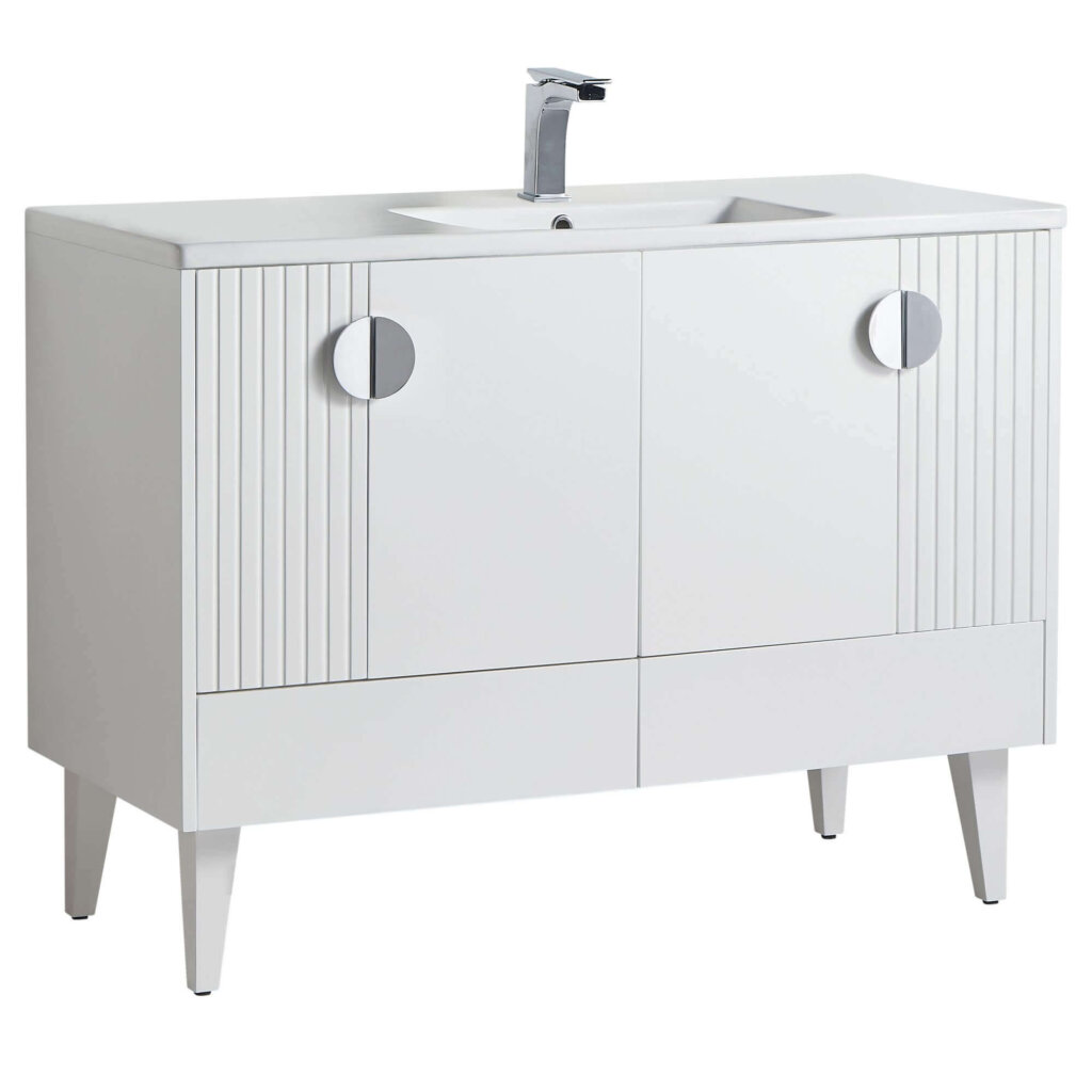 The Venezian 48 inch Bathroom Vanity features a modern white finish, two vertically grooved doors with round silver handles, a rectangular sink, chrome faucet, and four tapered legs, offering a sleek, minimalist design.