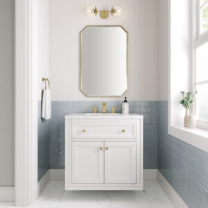 A modern bathroom with the Chicago 30 inch Bathroom Vanity Cabinet, gold faucet and handles, a rectangular gold-trimmed mirror, a globe light above, blue subway tile wainscoting, and a window ledge with a small plant.