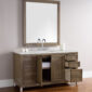 The Chicago 60 inch Single Bathroom Vanity Cabinet includes a wooden-framed mirror, spacious design with multiple drawers and cabinet, a sink with dual faucets, and a countertop adorned with a toilet paper roll and jar.