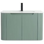 The Caskvalley 30 Inch Wall Mounted Bathroom Vanity With Sink offers a modern design featuring a sleek white countertop and integrated sink. Its base has a vertical ribbed pattern in muted green, harmonized by a centered black faucet for an elegant touch.