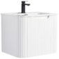 The Caskvalley 24 Wall Mounted Bathroom Vanity With Sink features a sleek modern design, vertical grooves, and a curved rectangular shape. Accented with a black single-handle faucet and integrated front handle, it blends style and functionality for any contemporary bathroom.