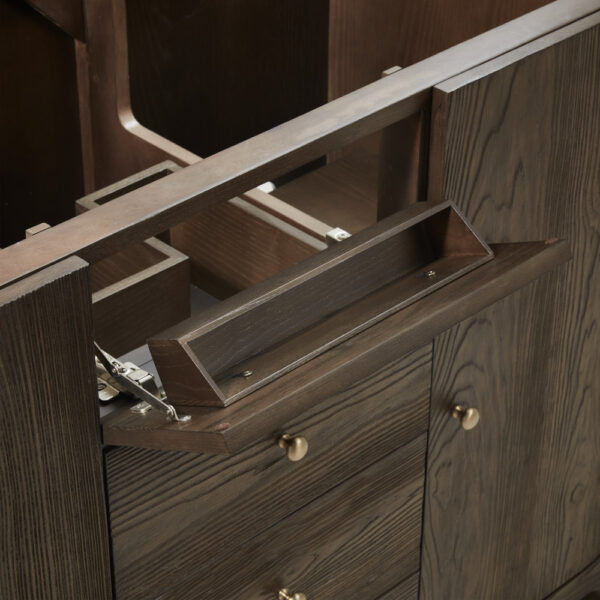 Close-up of a dark wood Gracyn 48 inch Bathroom Vanity revealing an open rectangular compartment with visible hinges and below, drawers featuring round brass knobs. The wood grain is highlighted, showcasing texture and craftsmanship.