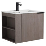The Elmridge 24 Wall Mounted Bathroom Vanity features a modern gray wood finish, sleek rectangular white sink, and black faucet. It includes a left open shelf, right cabinet door with black handle for an elegant touch.