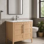 A modern bathroom with the Leafside 36 Inch Bathroom Vanity With Sink features a white countertop and square mirror. A towel rack to the left, gray tiled floors and walls, plus a window view of greenery outside provides a serene escape.