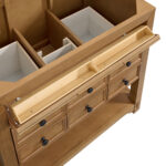 The Malibu 36 inch Bathroom Vanity Cabinet in Amber Birch features nine drawers with two top ones revealing shallow compartments, black handles, and a natural brown finish, combining style and function.
