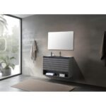 Modern minimalist bathroom featuring a Matera 36 Inch Wall Mount Bathroom Vanity With Countertop, rectangular mirror, wall-mounted faucet, beige towels on hooks, a potted plant by the window, and a neutral rug.