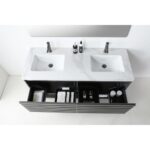 Overhead view of the Matera 60 Inch Wall Mount Double Bathroom Vanity With Countertop, showcasing a white marble top, two chrome faucets, and an open drawer filled with organized toiletries and personal care items.