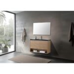 Minimalist bathroom with concrete walls, a large mirror, and the Matera 48 Inch Wall Mount Bathroom Vanity With Countertop. Two towels hang on the walls, a potted plant sits by the glass window, and a beige rug lies on the floor.