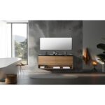 Modern bathroom with the Matera 72 Inch Wall Mount Double Bathroom Vanity With Countertop, double sinks, large mirror, freestanding tub, greenery, rolled towels, candle, and soft natural light through a spacious window.