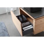 The Ocala 36 Inch Wall Mount Bathroom Vanity With Vessel Sink has an open drawer for organized storage and a gray countertop with a black basin, creating a stylish bathroom centerpiece.