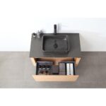 The Ocala 36 Inch Wall Mount Bathroom Vanity With Vessel Sink boasts a modern wood finish, black stone sink and faucet, plus an open drawer for toiletries—ideal for contemporary bathrooms.