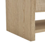 Close-up of the Solene 36 inch Bathroom Vanity Cabinet corner, highlighting its light wood grain and refined woven rattan accent on the upper section.
