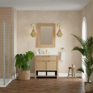 A bathroom with beige walls, a Solene 36 inch Bathroom Vanity Cabinet and mirror, two pendant lights, a potted plant, a stool, a towel ring, and a shower with glass doors. Sunlight streams through an arched window onto the tiled floor.