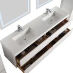 The Assisi 72 inch Wall Mounted Double Bathroom Vanity With Sink offers a sleek white design, chrome faucets, four open drawers for storage, and is complemented by two large mirrors above the sinks.