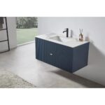 Modern bathroom with a Barcelona 42 Inch Wall Mount Bathroom Vanity in blue, white countertop, black faucet, decorative items, large window with greenery view, gray floor tiles, and a light rug completing the look.