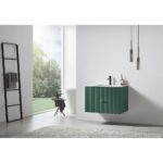 Modern bathroom featuring the Barcelona 30 Inch Wall Mount Bathroom Vanity in green, black faucet, pendant lights, ladder towel rack, round bathtub, side table, and large window with tranquil tree views. Light minimalist décor.