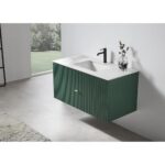 Modern bathroom with a Barcelona 42 Inch Wall Mount Bathroom Vanity featuring green vertical grooves, a white integrated sink, black faucet, and a small vase with dried flowers; large window and rug also visible.