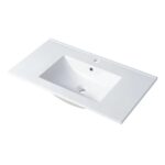 The Valencia 36 inch Wall Mount Vanity With Sink features a white rectangular sink with a flat, wide countertop, integrated rectangular basin, single faucet hole, and overflow outlet for a modern bathroom look.