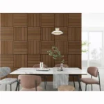 Modern dining area with a marble table, mismatched upholstered chairs, and a checkered runner. Behind is a feature wall clad in Acoustic Interior Wall Panels with square wood details, vertical slats, and large windows for natural light.