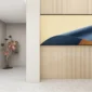 A modern interior with light walls and floors features a large abstract artwork on the left, a decorative metal flower sculpture in the corner, and another abstract piece mounted on a 3D Interior Wall Panel.
