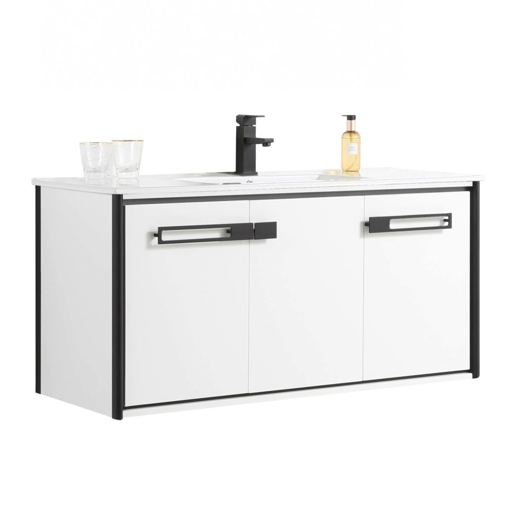 The Oakville 48 inch Modern Bathroom Vanity is white with black handles and trim, a white countertop, black faucet, two clear glasses, a soap dispenser, and two cabinet doors.
