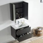Modern bathroom with a Valencia 30 inch Wall Mount Vanity With Sink, dark wood finish, two open drawers, a wall-mounted mirrored cabinet with open doors showing toiletries, and a woven basket of towels on the floor nearby.