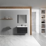 Modern minimalist bathroom with gray walls, a Valencia 36 inch Wall Mount Vanity With Sink, square mirror, single gray chair, wood-accented decor shelf, open shelving, and white marble floors and shower walls with black stripes.