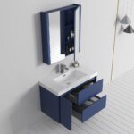 The Valencia 36 inch Wall Mount Vanity With Sink, in modern blue and white, features two open drawers and a cabinet. Above it, a mirrored medicine cabinet with side shelves organizes toiletries in a minimalist white setting.