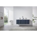 Minimalist bathroom with a Barcelona 60 Inch Wall Mount Double Bathroom Vanity With Top, modern fixtures, and white countertop. A freestanding tub sits by a large garden-view window. Towel rack and leafy plant complete the decor.