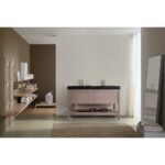 Modern bathroom with neutral tones, featuring the Bibury 48 Inch Double Bathroom Vanity with Top, black countertop, gold faucets, large mirror, rug, open shelves with towels and decor, and a full-length mirror by a window with sheer curtains.