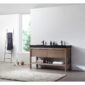Modern bathroom featuring the Bibury 60 Inch Double Bathroom Vanity with Top, black countertop, dual black faucets, toiletries, a towel rack with dark towels, white bathtub, and plush rug completing the bright minimalist space.